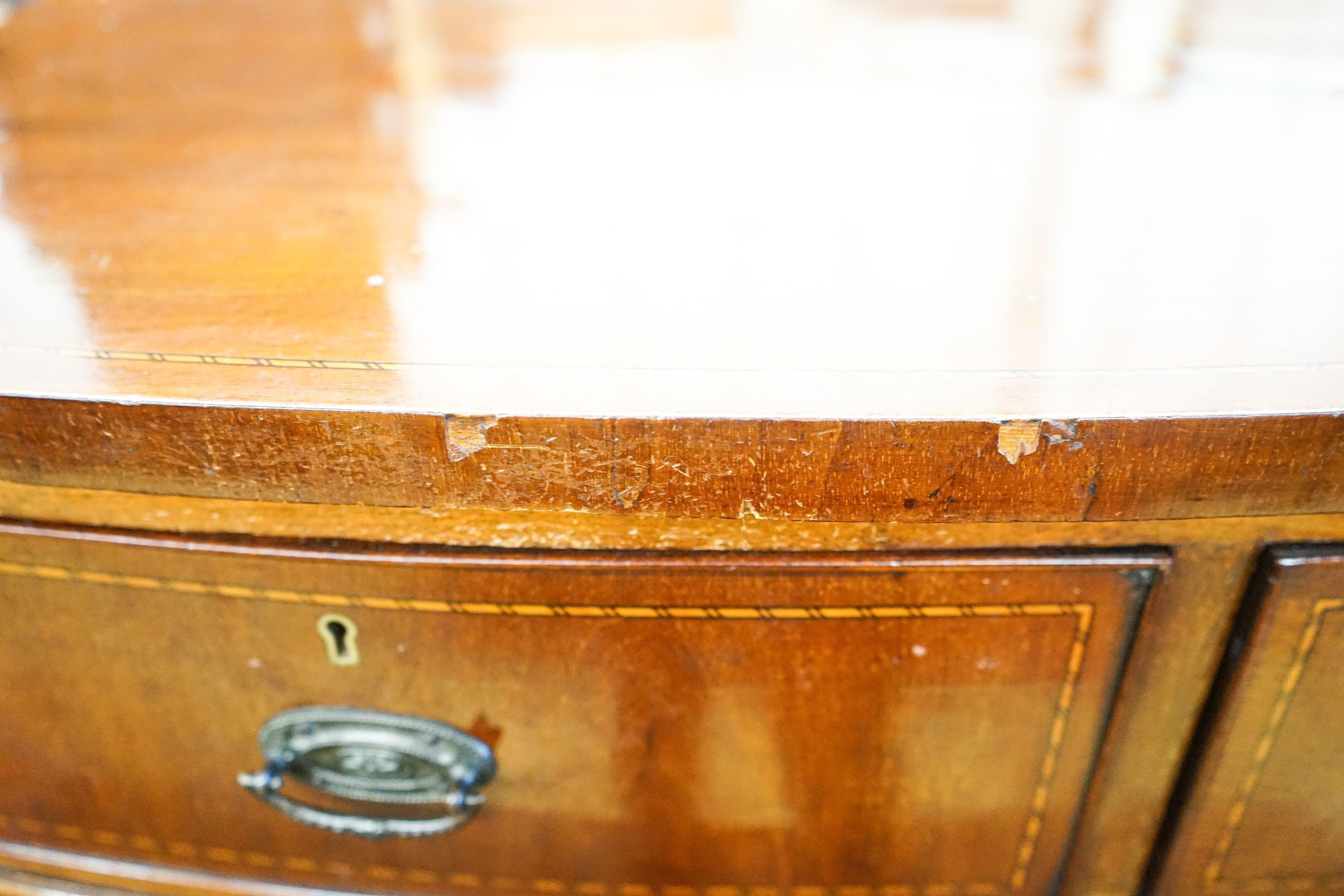 An Edwardian mahogany bowfront side cabinet, width 92cm, depth 47cm, height 113cm